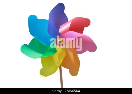 Eine Windmühle aus Kunststoff mit Holzgriff. Kein Kinderspielzeug. Stockfoto