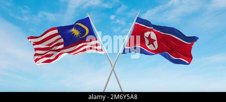 Zwei gekreuzte Flaggen Nordkorea und Malaysia, die im Wind am bewölkten Himmel winken. Beziehungskonzept, Dialog, Reisen zwischen zwei Ländern. 3D illustr Stockfoto