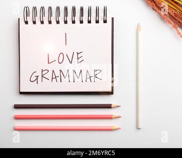 Schreiben mit Text „I Love Grammar“. Ein Wort über Bewunderungsakt, System und Struktur der Sprache Stockfoto