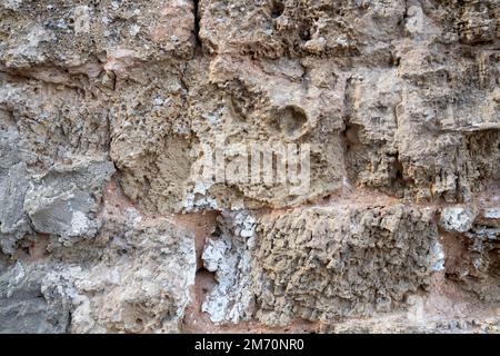 Grauer und brauner rauer Steinhintergrund Stockfoto