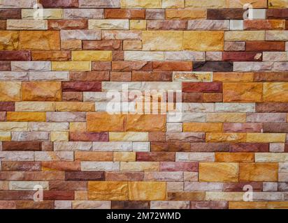 Stein gemauerte Wand Backgound Textur Stockfoto