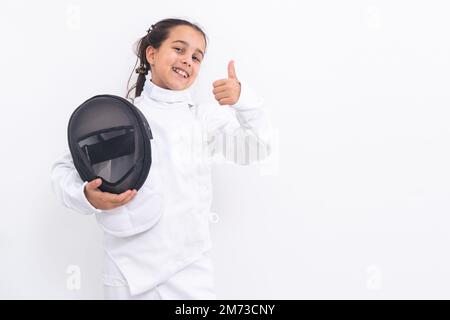 Kleines Mädchen in einem Fechtanzug Stockfoto