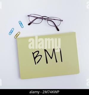 Text mit Inspirations-BMI. Geschäftsüberblick Methode zur Schätzung des Körperfettgehalts nach Gewicht und Körpergröße Stockfoto