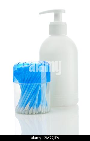 Gepolsterte Stöcke und weiße Flasche Stockfoto