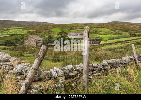 Ein Pennine Way-Wegweiser in Thwaite, Swaledale Stockfoto
