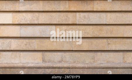 Dolomitsteinmauer. Rustikal. Architektonische Details Stockfoto