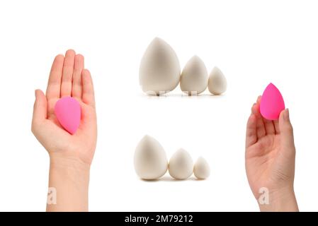 Frauenhand mit pinkfarbenem Schönheitsschwamm isoliert auf weiß. Stockfoto