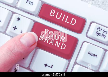 Schreiben von Textanzeigen Aufbau Ihrer Marke. Geschäftsansatz Erstellen Sie eine kommerzielle Identitäts-Marketing-Werbung Stockfoto