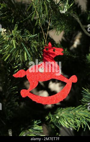 Rote pferdförmige Neujahrsdekoration Stockfoto