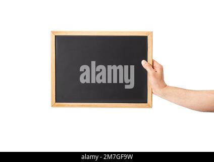 Ein Mann mit einer kleinen Tafel mit weißem Hintergrund und Kopierraum. Stockfoto