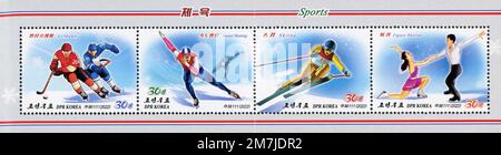 2022 Briefmarken aus Nordkorea. Wintersport. Eishockey, Skifahren, Speedskating und Eiskunstlauf Stockfoto