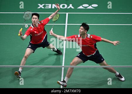 Kuala Lumpur, Malaysia. 11. Januar 2023. Chinas Liu Yuchen/Ou Xuanyi (L) treten am 11. Januar 2023 bei den Malaysia Open 2023 in Kuala Lumpur, Malaysia, in der Männerrunde in der 32 gegen Englands Ben Lane/Sean Vendy an. Kredit: Chong Voon Chung/Xinhua/Alamy Live News Stockfoto