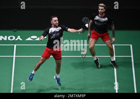 Kuala Lumpur, Malaysia. 11. Januar 2023. Englands Ben Lane (Front)/Sean Vendy treten am 11. Januar 2023 bei den Malaysia Open 2023 in Kuala Lumpur, Malaysia, während der Männer-Doppel-Runde 32 gegen Chinas Liu Yuchen/Ou Xuanyi an. Kredit: Chong Voon Chung/Xinhua/Alamy Live News Stockfoto