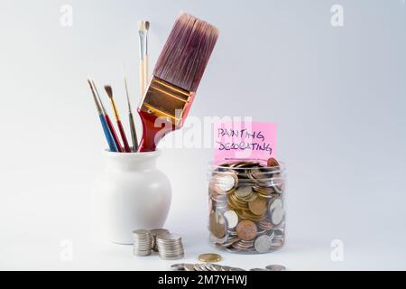 Sparkassendose für die Malerei und Dekoration von Hausrenovierungen Budgetkonzept Stockfoto