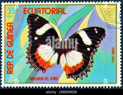 Abgesagte Briefmarke, gedruckt von Äquatorialguinea, die Schmetterling zeigt, ca. 1972. Stockfoto