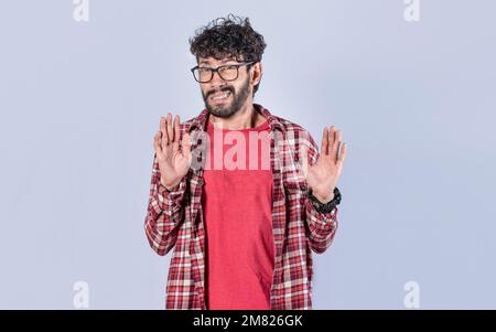 Person mit Leugnen-Ausdruck, die die Hände bewegt. Ein Mann mit leugnen Ausdrücken, der sich peinlich weigert Stockfoto