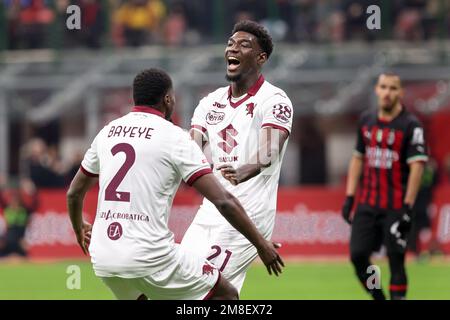 Mailand, Italien. 12. Januar 2023. Italien, Mailand, 11 2023. januar: Michel Adopo (Torino-Mittelfeldspieler) erzielt und feiert das 1-0. Tor mit 114' beim Fußballspiel AC MILAN vs TORINO, last16 Coppa Italia 2022-2023 San Siro Stadion (Bild: © Fabrizio Andrea Bertani/Pacific Press via ZUMA Press Wire) NUR REDAKTIONELLE VERWENDUNG! Nicht für den kommerziellen GEBRAUCH! Stockfoto