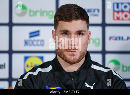 Kattowitz, Polen. 14. Januar 2023. Handball: Weltmeisterschaft, DHB-Pressekonferenz vor dem zweiten Gruppenspiel der deutschen Mannschaft. Captain Johannes Golla sitzt auf dem Podium. Kredit: Jan Woitas/dpa/Alamy Live News Stockfoto