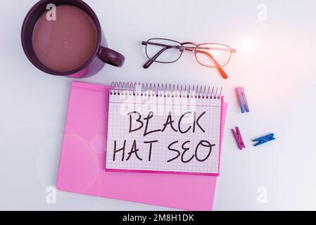 Handschrift Text Black hat Seo. Konzeptionelle Foto-Suchmaschinen-Optimierung mit Techniken, um Browser zu betrügen Stockfoto