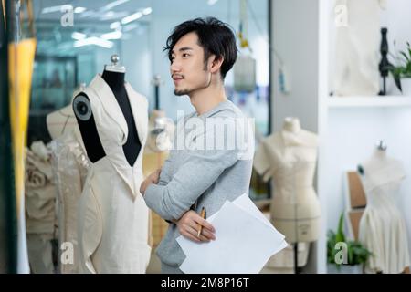 Junger Bekleidungsdesigner Stockfoto