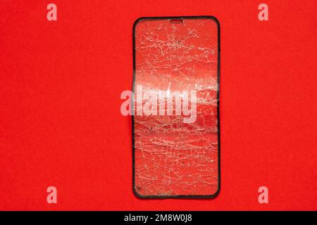 Zerbrochenes gehärtetes Schutzglas für das Telefon Stockfoto