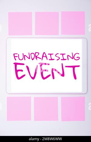 Handgeschriebenes Schild Fundraising Event. Ein Wort über eine Kampagne, deren Zweck es ist, Geld für eine Sache zu sammeln Stockfoto