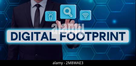 Textzeichen mit digitalem Fußabdruck. Konzept bedeutet, dass digitale Technologie zur Steuerung des Fertigungsprozesses verwendet wird Stockfoto
