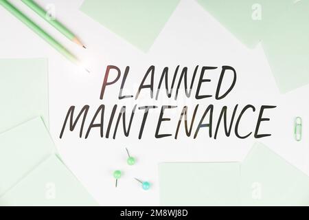 Textzeichen mit planmäßiger Wartung. Regelmäßige Überprüfung des Geschäftsansatzes Stockfoto