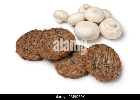 Frisch gebackene Champignon-Burger und Pilze sind auf weißem Hintergrund isoliert Stockfoto