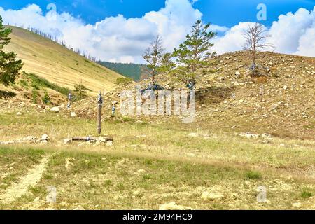 Rituelle Anhalter in der Buryat-Steppe auf dem Weg zum Barguzin Datsan, dem Gesicht der Göttin Yanzhima Stockfoto