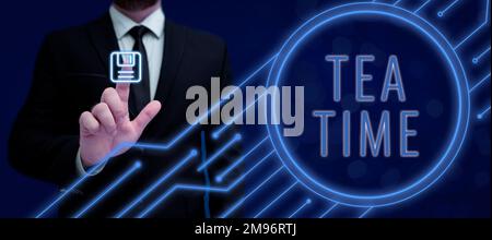 Inspiration mit dem Schild „Tea Time“. Internetkonzept Nachmittagszeit, wenn manche Leute eine kleine Mahlzeit essen Stockfoto