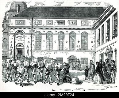 Almanaktag in der Stationers' Hall, City of London, Ende November, als die Almanaks des nächsten Jahres verkauft wurden. Die Träger haben die Taschen voller Bücher im ganzen Land getragen. Stockfoto