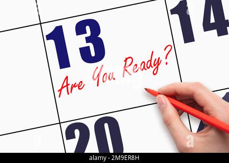 13. Tag des Monats. Handgeschriebener Text: BIST DU AM Kalenderdatum BEREIT? Geschäftlich. Tageskonzept. Stockfoto
