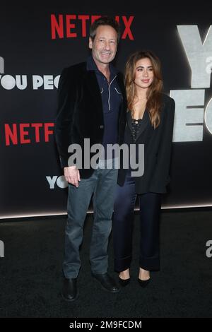 17. Januar 2023 – Los Angeles, Kalifornien – David Duchovny, Monique Pendleberry. Los Angeles Premiere von Netflix's „You People“ im Regency Village Theatre in Los Angeles. NUR REDAKTIONELLE VERWENDUNG! Nicht für kommerzielle ZWECKE! Stockfoto