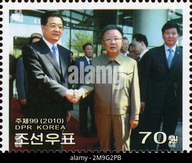 2010 Nordkorea-Stempel. Kim Jong Il Besucht China. LEB wohl von Hu Jintao Stockfoto