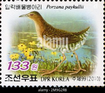 2010 nordkoreanische Briefmarke mit dem Band-Bellied Crake (Porzana paykullii) für die BIRDPEX 9 International Stamp Exhibition. Stockfoto