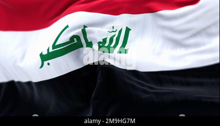 Detail der Irak-Nationalflagge, die winkt. Rot, weiß, schwarz gestreift & „God is the Greatest“ in der Kufic-Schrift. Geriffelter Stoff. Strukturierter Hintergrund. Auswählen Stockfoto