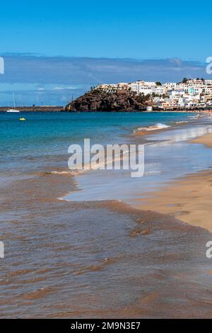 View of the coast of Morro Jable. turquoise ocean. Vertical Picture. Fuerteventura - Canary Islands. Stock Photo