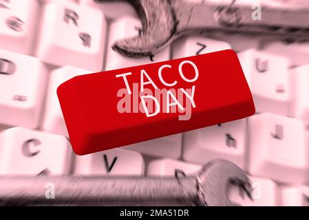 Schreiben mit Text Taco Day. Feiertag zum Geschäftskonzept, der den Konsum von Tacos in den USA fördert Stockfoto