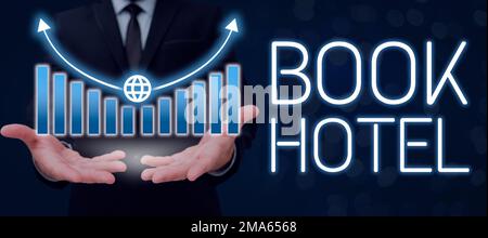 Handgeschriebener Text Book Hotel. Ein Wort für eine Vereinbarung, die Sie treffen, um ein Hotelzimmer oder eine Unterkunft zu haben Stockfoto