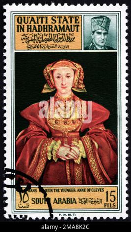 SÜDJEMEN - CA. 1967: Ein im südlichen Jemen gedruckter Stempel des Bundesstaates Quaiti in Hadhramaut zeigt Anne von Cleves, Porträt, Gemälde von Hans Holbein dem Jungen Stockfoto