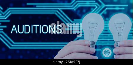 Schreiben mit Anzeige von Text Auditions. Ein Wort über eine Probevorstellung, um die Verdienste eines Entertainers zu bewerten Stockfoto