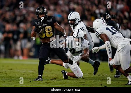 Purdue Running Back Dylan Downing (38) Runs For A Gain Against ...