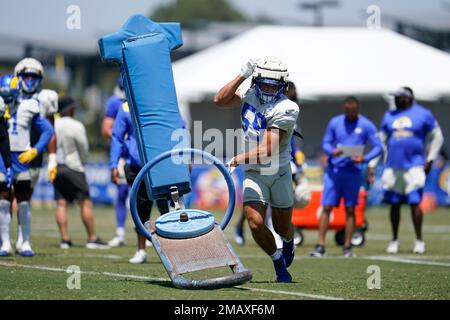 Los Angeles Rams linebacker Travin Howard, back, interrupts a pass intended  to Seattle Seahawks tight end Jacob Hollister in an NFL football game  Sunday, Dec. 8, 2019, in Los Angeles. (AP Photo/Kyusung