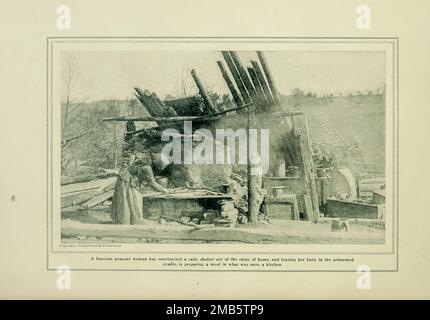 Die Zubereitung des Abendessens in den Ruinen eines Heims aus dem Buch The Story of the Great war; die vollständigen historischen Aufzeichnungen der Ereignisse bis dato VON REYNOLDS, Francis Joseph, 1867-1937; Churchill, Allen Leon; Miller, Francis Trevelyan, 1877-1959; Wood, Leonard, 1860-1927; Knight, Austin Melvin, 1854-1927; Palmer, Frederick, 1873-1958; Simonds, Frank Herbert, 1878-; Ruhl, Arthur Brown, 1876. Band VII Veröffentlicht 1920 Stockfoto