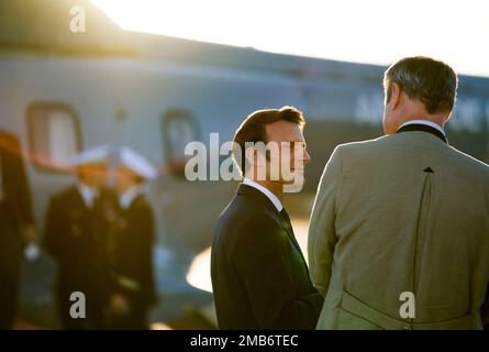 French President Emmanuel Macron, left, speaks with Markus Soeder, Minister-President of Bavaria, as he arrives for a G7 summit at Franz-Joseph-Strauss Airport in Munich, Germany, Saturday, June 25, 2022. The G7 Summit will take place at Castle Elmau near Garmisch-Partenkirchen from June 26 through June 28, 2022. (AP Photo/Markus Schreiber)