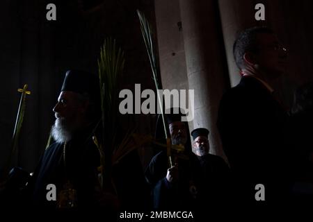 Orthodox Christian clergy mark Palm Sunday at the Church of the Holy
