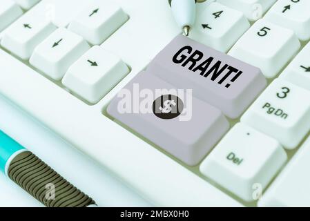 Inspiration mit Schild Grant. Ein Wort für Geld, das von einer Organisation oder Regierung für einen Zweck vergeben wird. Ein Stipendium Stockfoto