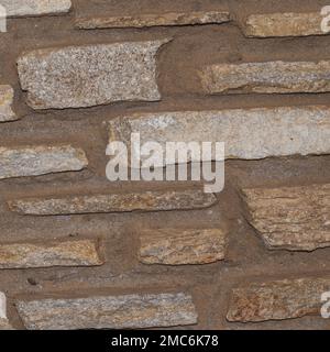 Rustikaler und gealterter Wandstein, Außenwand Stockfoto