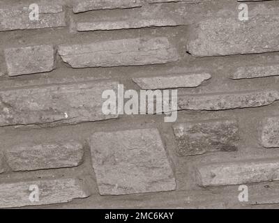 Rustikaler und gealterter Wandstein, Außenwand Stockfoto